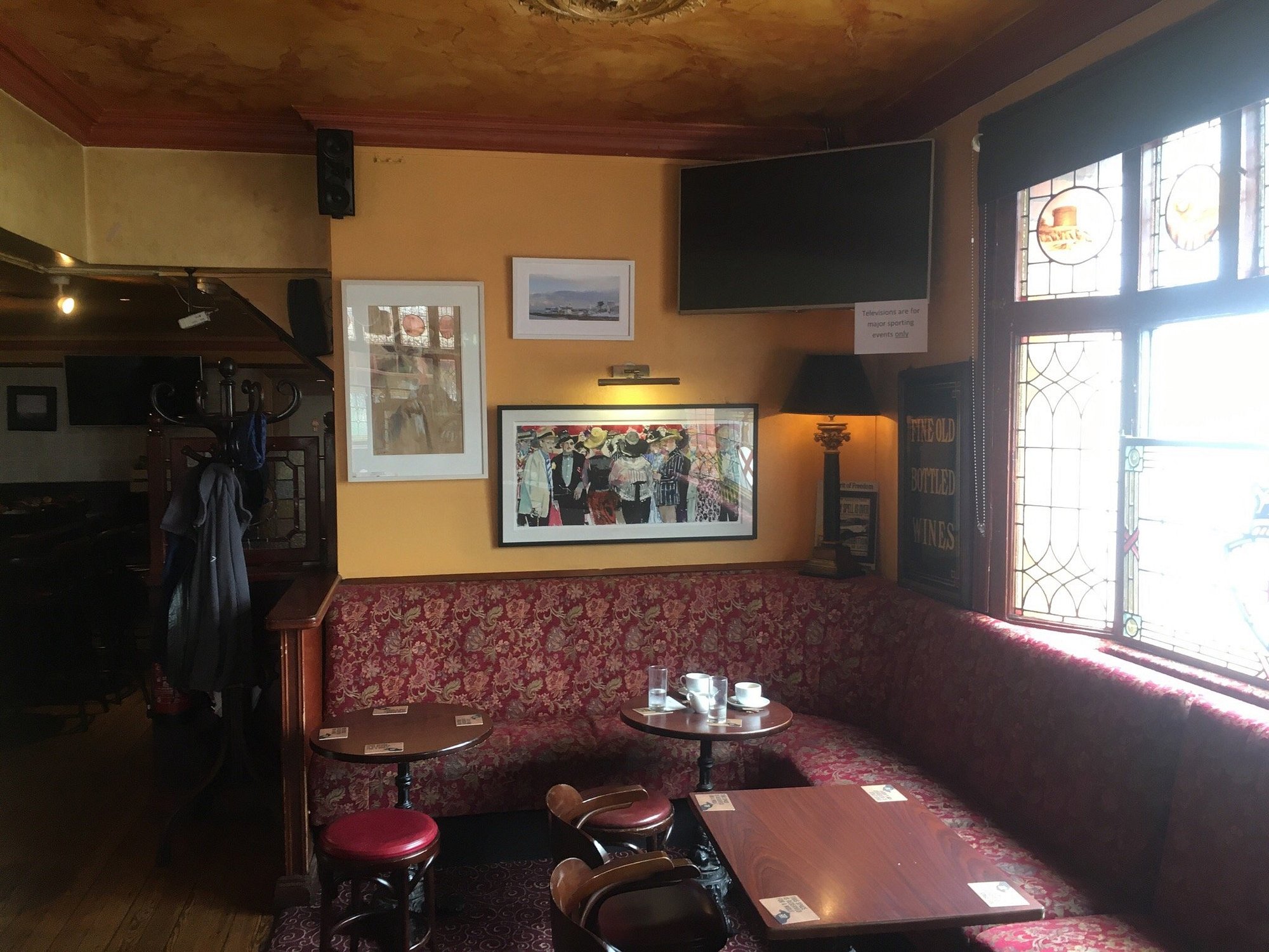 The whiskey shelf at Fitzgerald's, lined with Irish whiskies